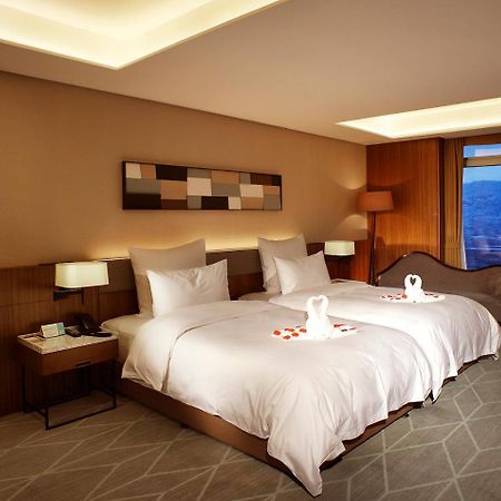 Chongqing The Lotus Hotel Экстерьер фото